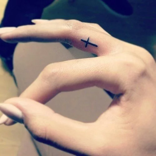 49 Creative Cross Tattoos On Fingers  Tattoo Designs  TattoosBagcom
