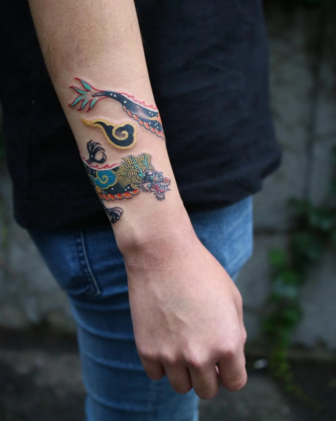 a delicate dragon that wraps around the arm swipe to see it in action    Around arm tattoo Wrap around tattoo Arm tattoos snake
