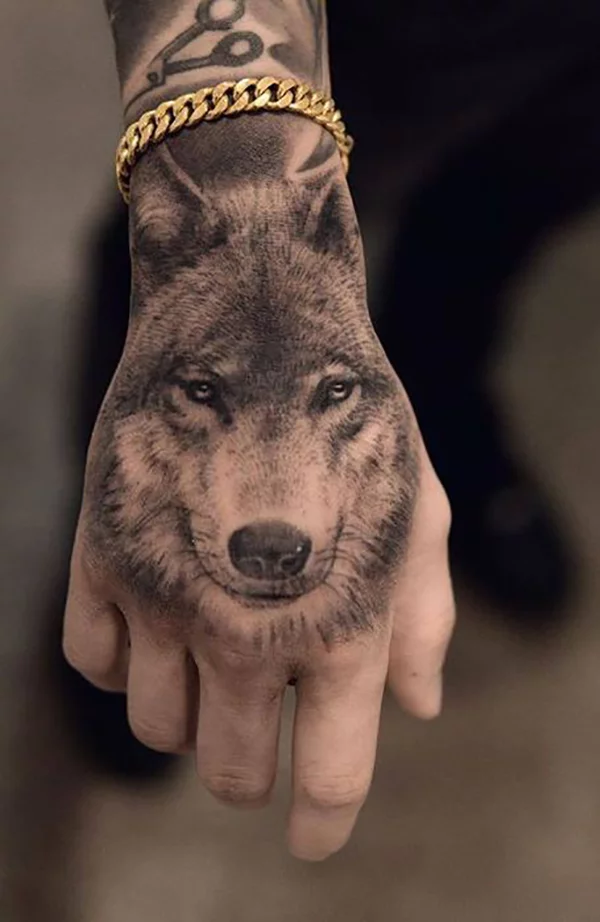 Wolf hand tattoo by Ivan  Hammersmith Tattoo  Hand tattoos Finger tattoos  Hand tattoos for guys