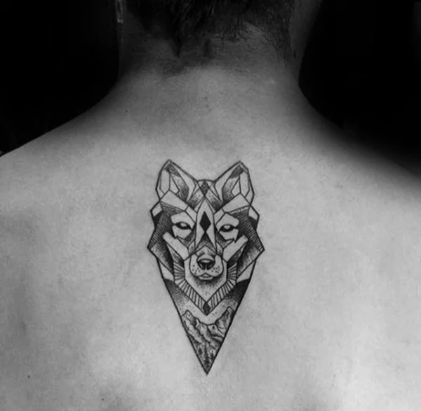 Wolf Tattoo with small forest beneath it Made whole Tattoo in black and  grey shades with little blue color in eyes Thanks to an old  Instagram