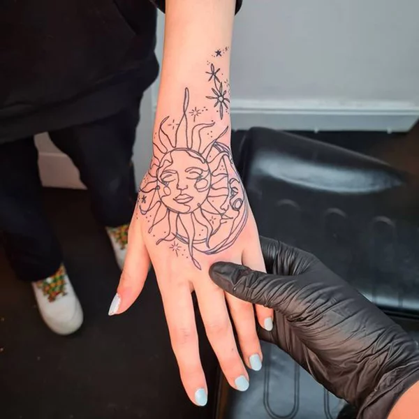 Columbus OH Tattoos on Instagram quiltheheathen did these sun  moon  hand tattoos along with freehand plants drawn down his clients whole arm  Swipe to see the process  freehandtattoo daintytattoo femininetattoo 