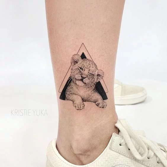 Young lion tattoo by Dani Ginzburg  Post 30765