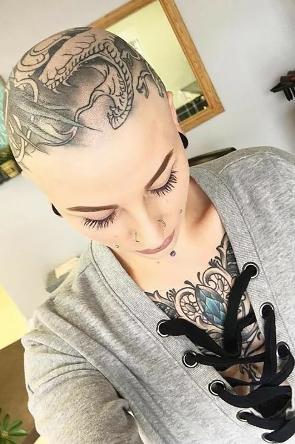 Download A Woman With Tattoos On Her Head  Wallpaperscom